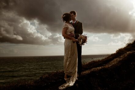 Bride and groom on the clifftop at Beacon Crag, Porthleven, Cornwall wedding photography