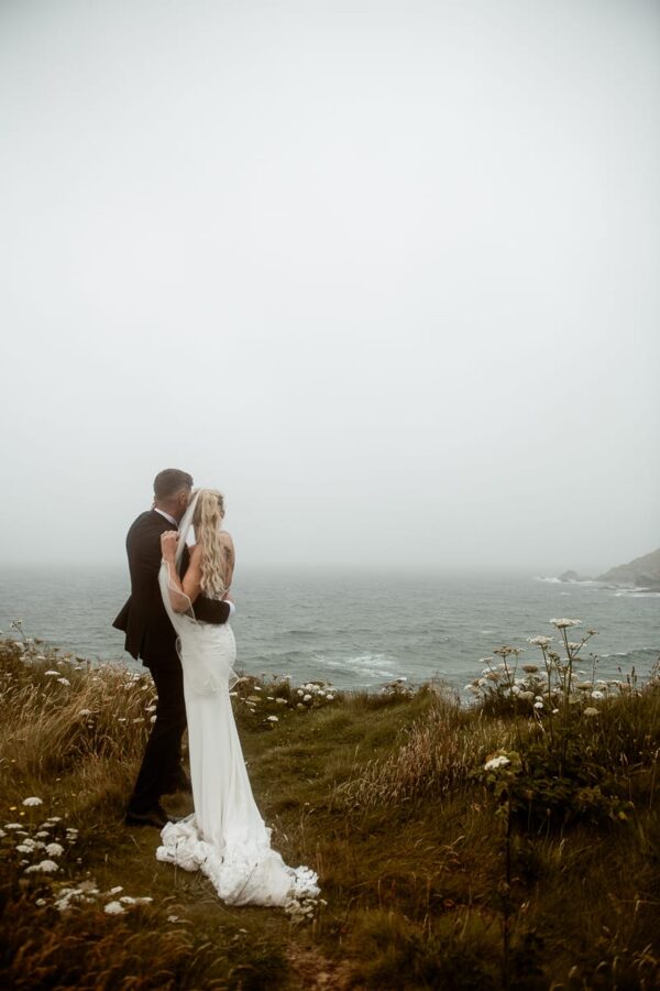 Kitty and Luke's wedding at Gunwalloe Church, Cornwall by lifestyle photography Cornwall